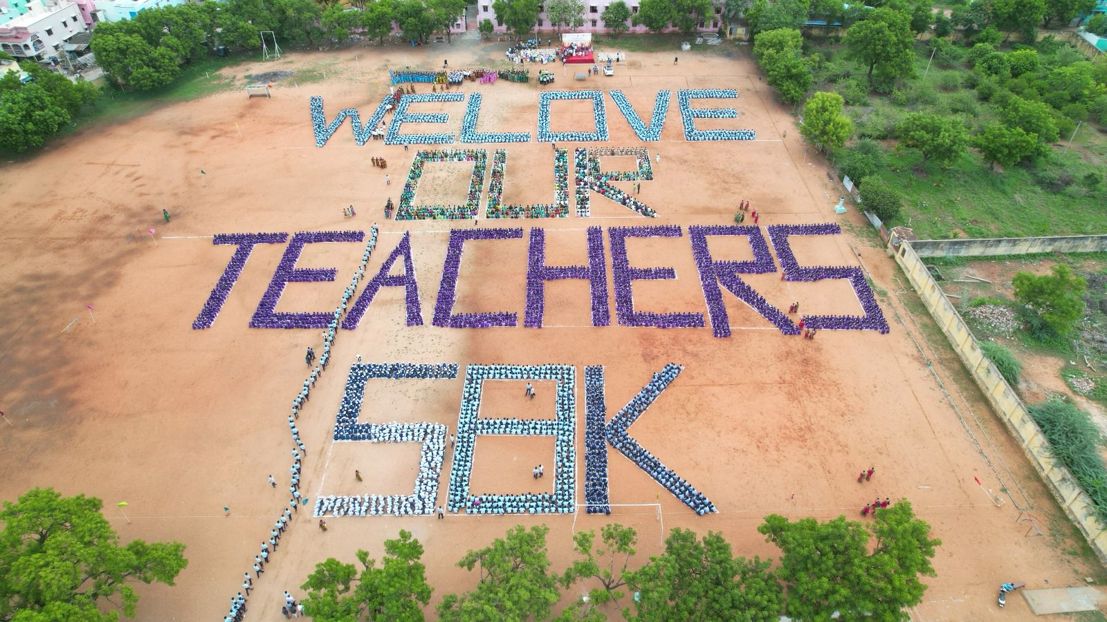 RHYTHMIC CLAPS WITH 5900 STUDENTS FOR A CONTINUOUS 10 MINUTES TO CREATE AWARENESS ABOUT THE HEALTH BENEFITS OF CLAPPING THE HANDS